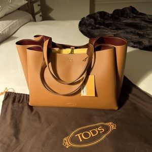 Brand NWT, Tod’s Bag, Medium Size, $1,545 retail, Brown with burgundy interior